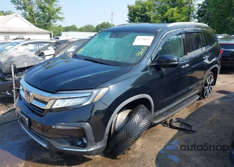 2019 Honda Pilot Elite z USA, uszkodzony, nr VIN 5FNYF6H09KB005128